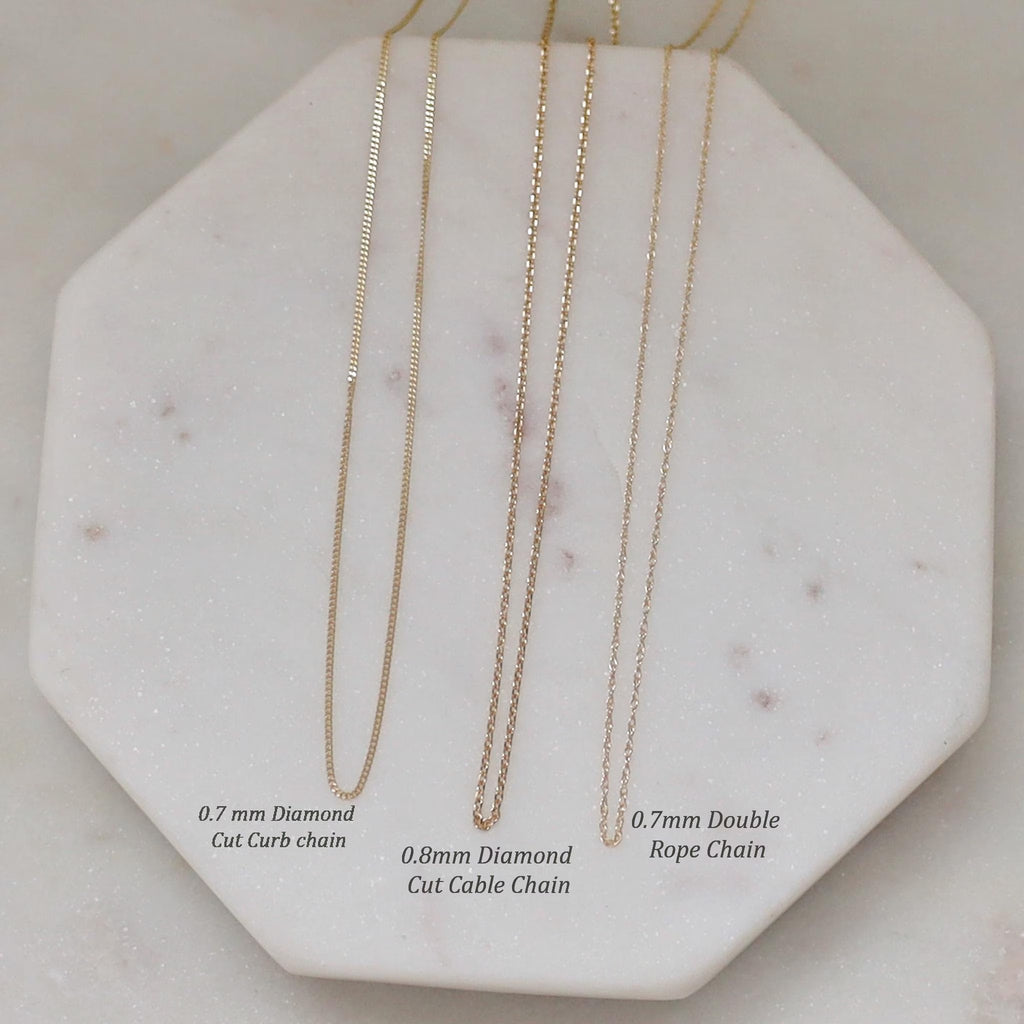 Collar con cruz de oro macizo de 14 quilates